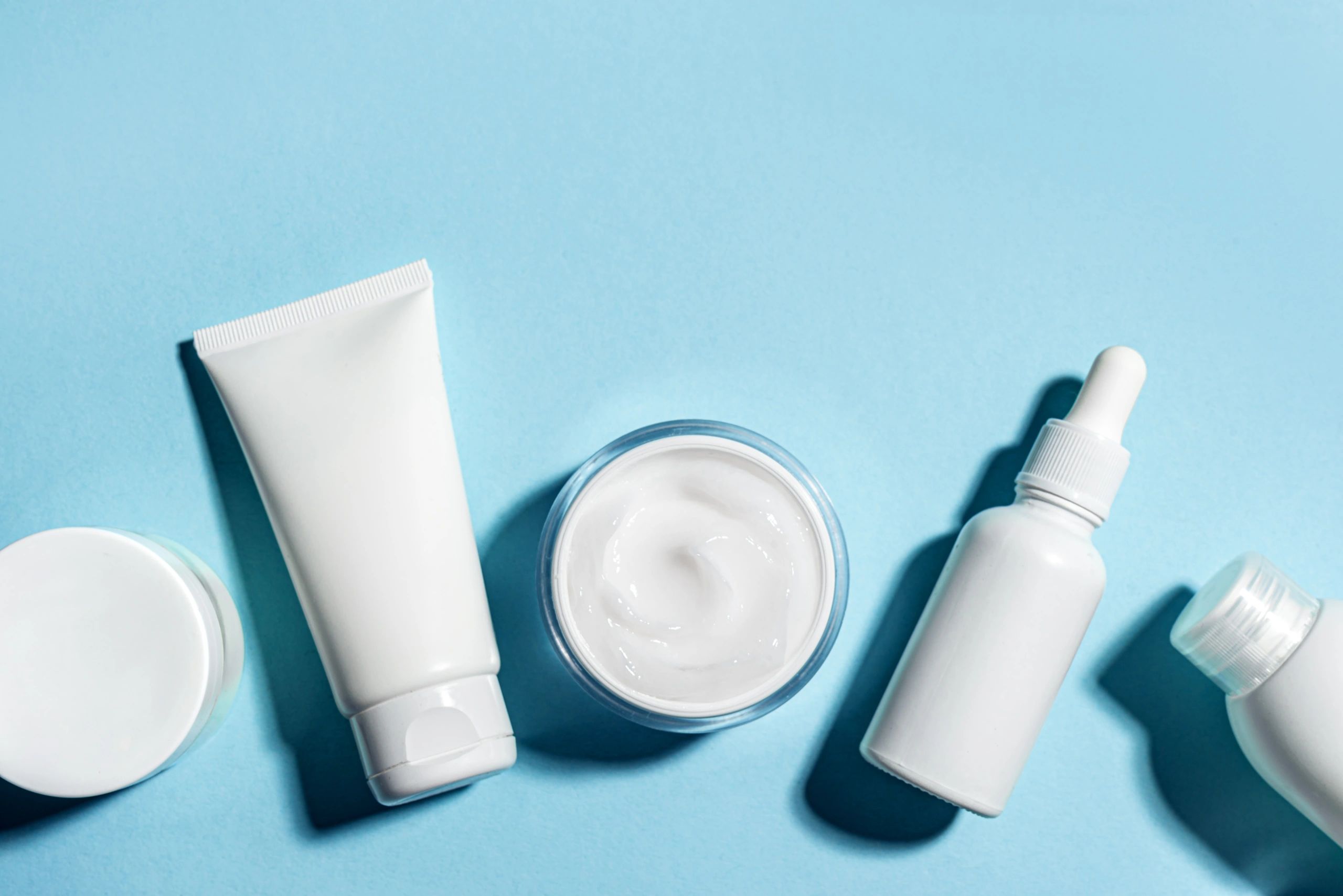 Minimal skincare and beauty product flat lay