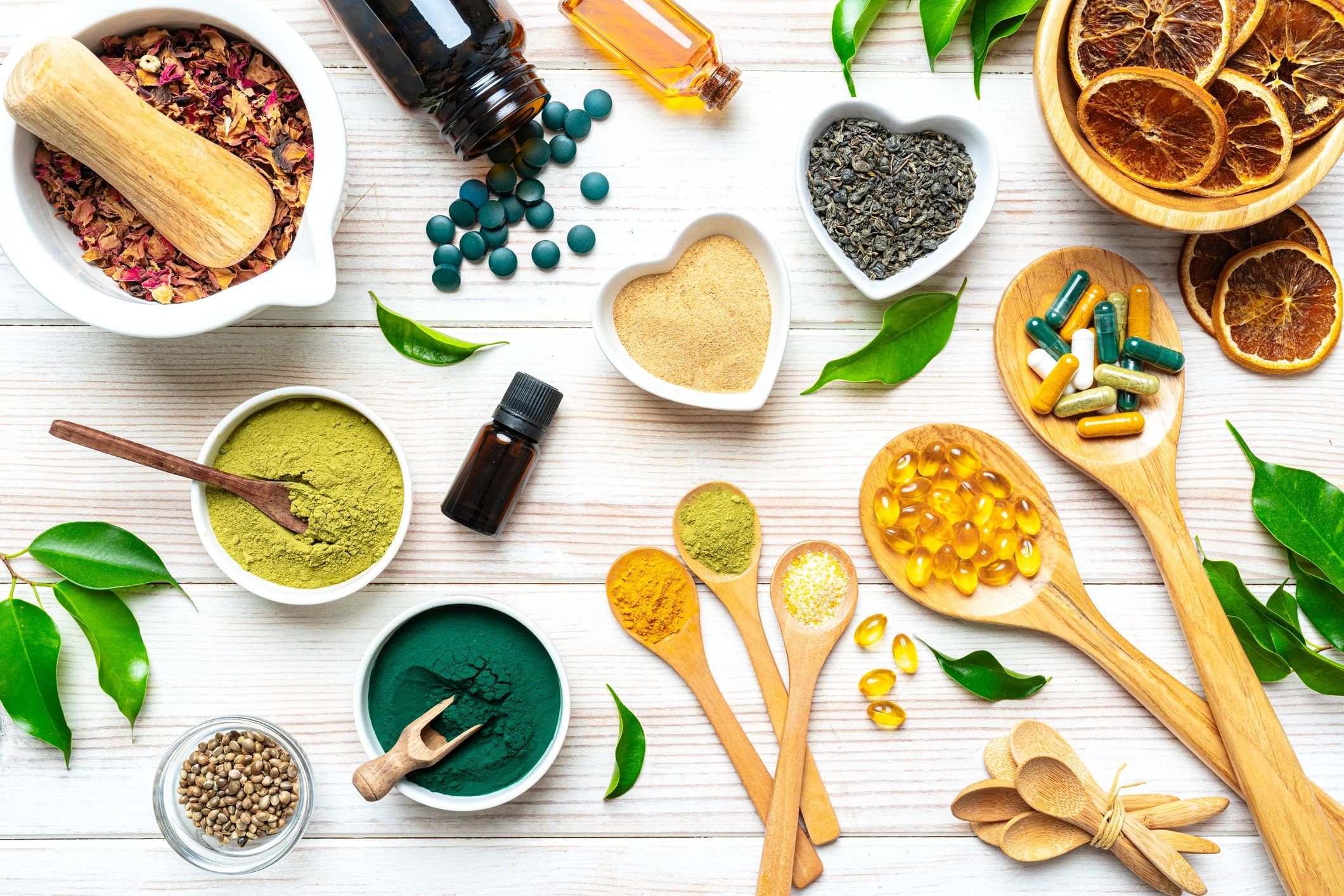 Assorted vitamins and supplements arranged neatly on a table