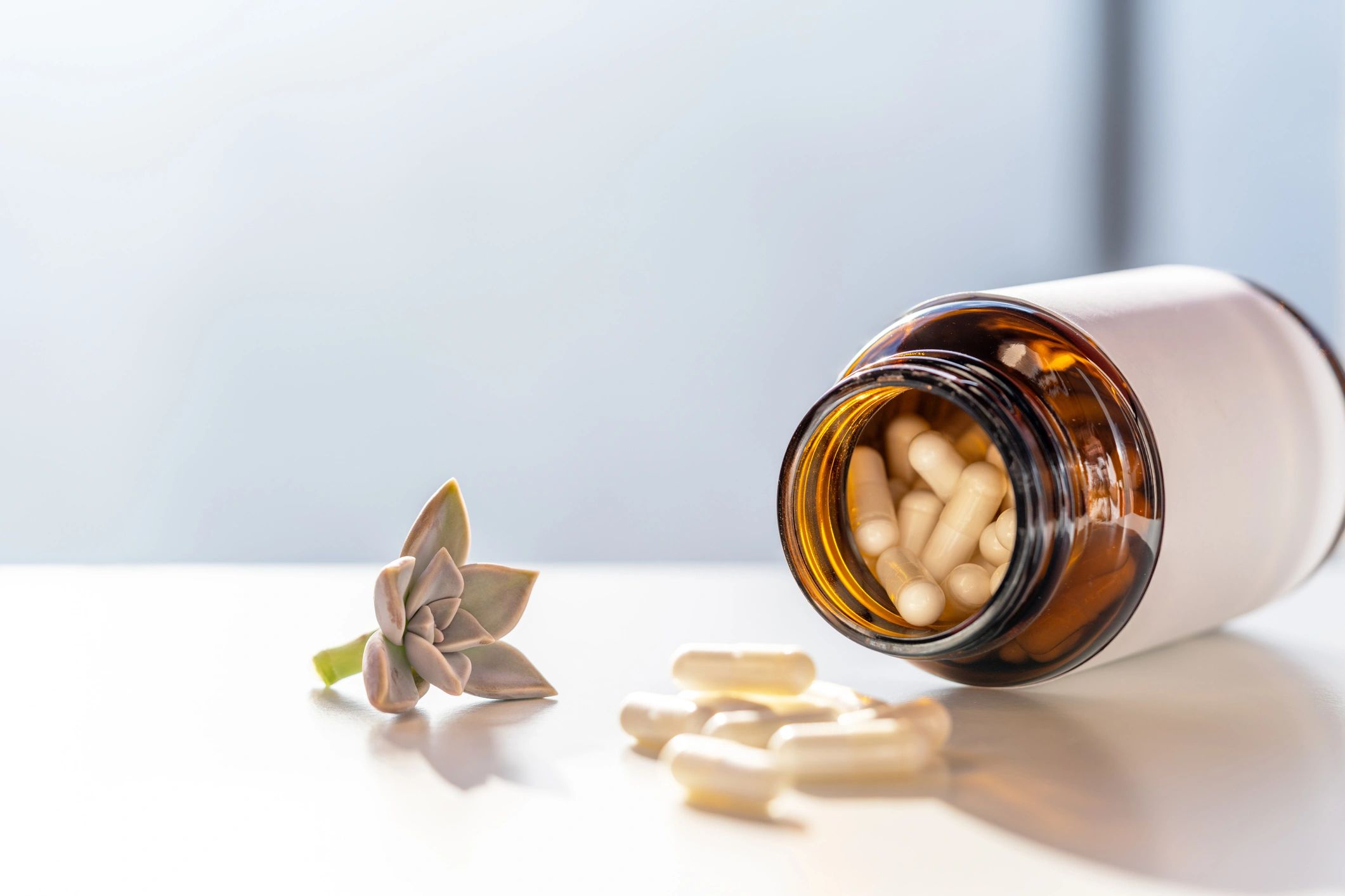 Premium supplement bottle with capsules